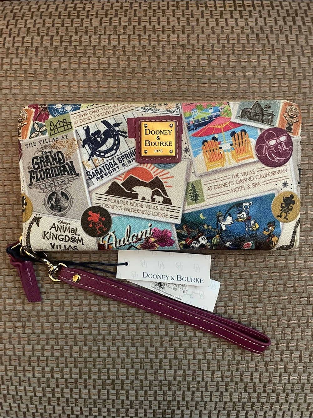 Dooney & Bourke Disney Vacation Club Travel Patch Wristlet with Magenta Strap